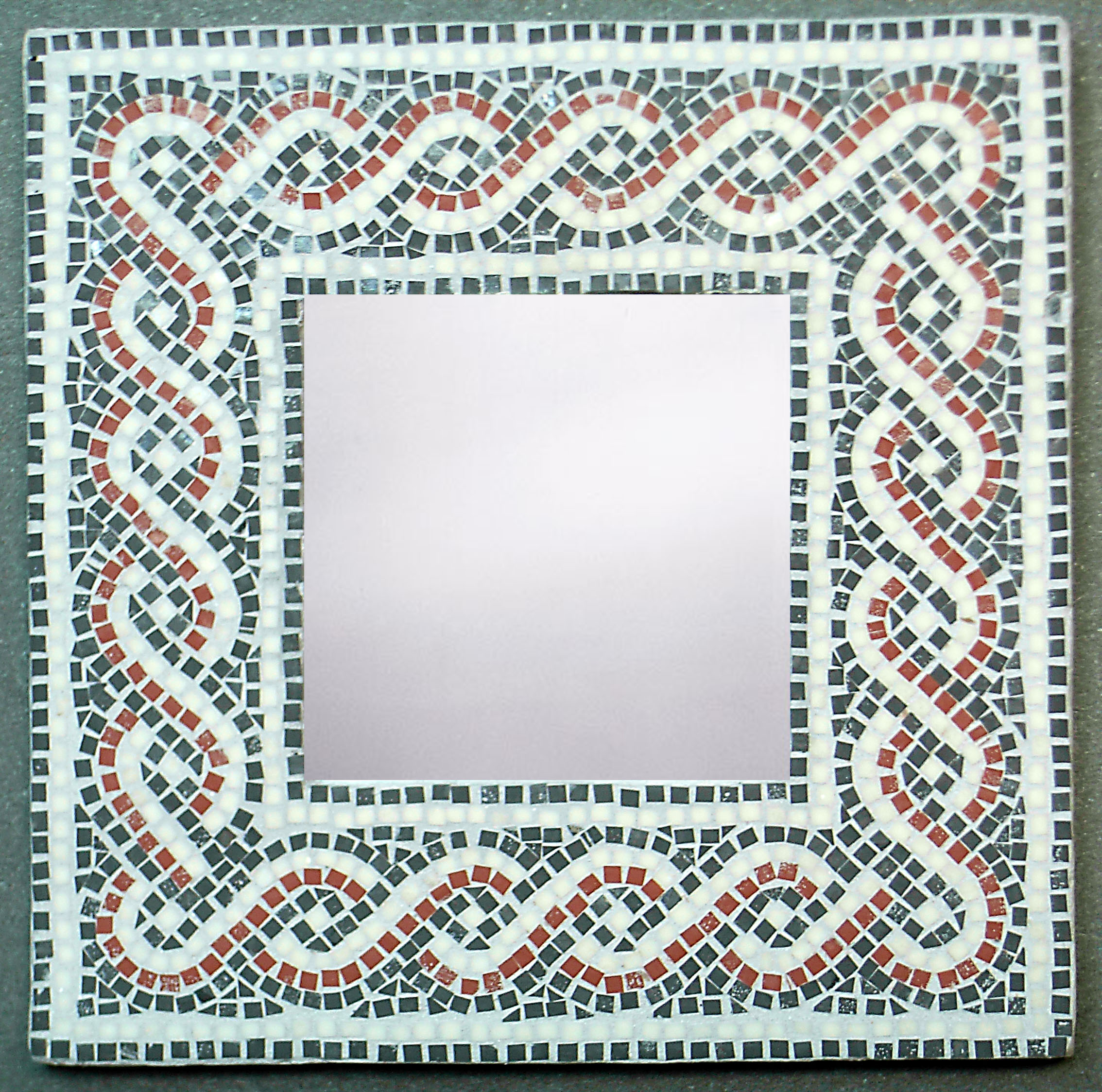 Mirror with mosaic frame.