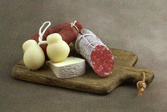 Small board with cheese and salami